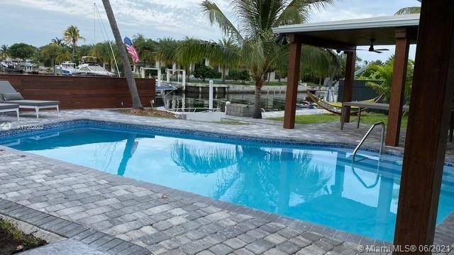 Stunning and spacious waterfront property in the prestigious neighborhood of Keystone Islands.