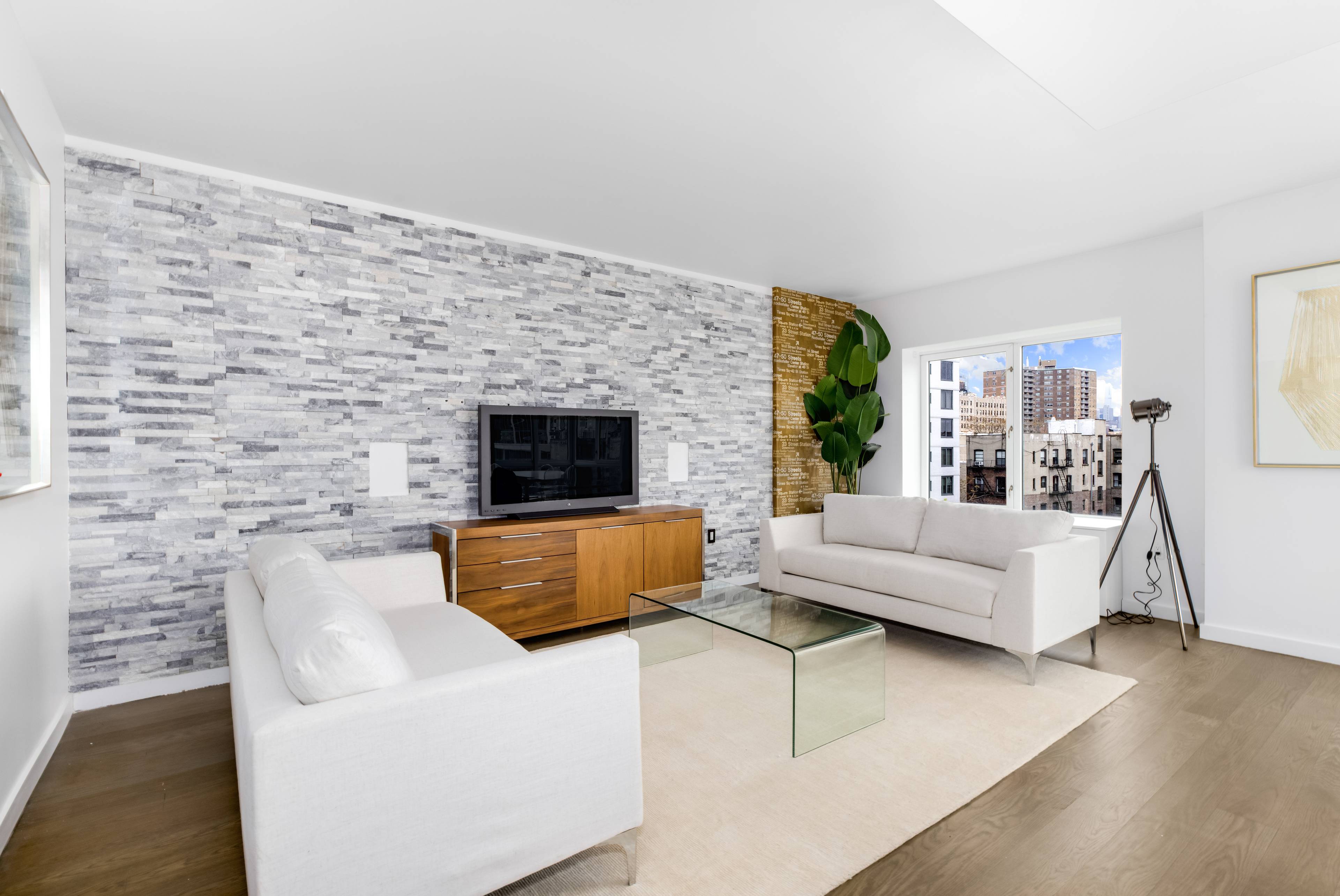 The sights of the city unfold at your feet in this sun filled two bedroom, two bathroom condominium with private outdoor space, perfectly positioned at the intersection of the East ...