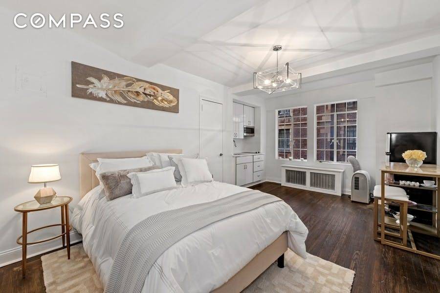 NO BOARD APPROVAL REQUIRED SPONSOR UNIT Centrally located in the heart of midtown, this spacious studio is brimming with pre war charm.