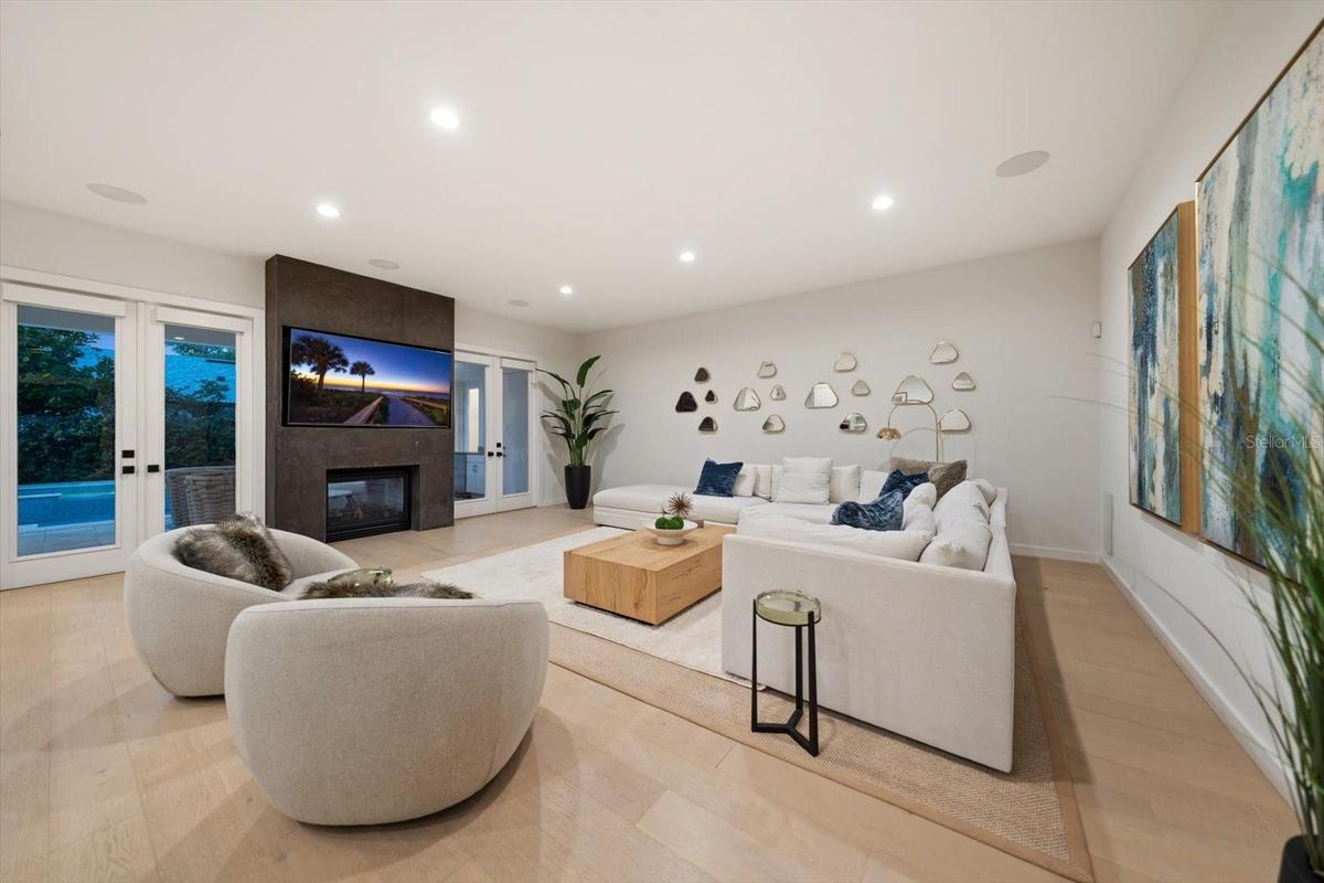 family room with double sided gas fireplace