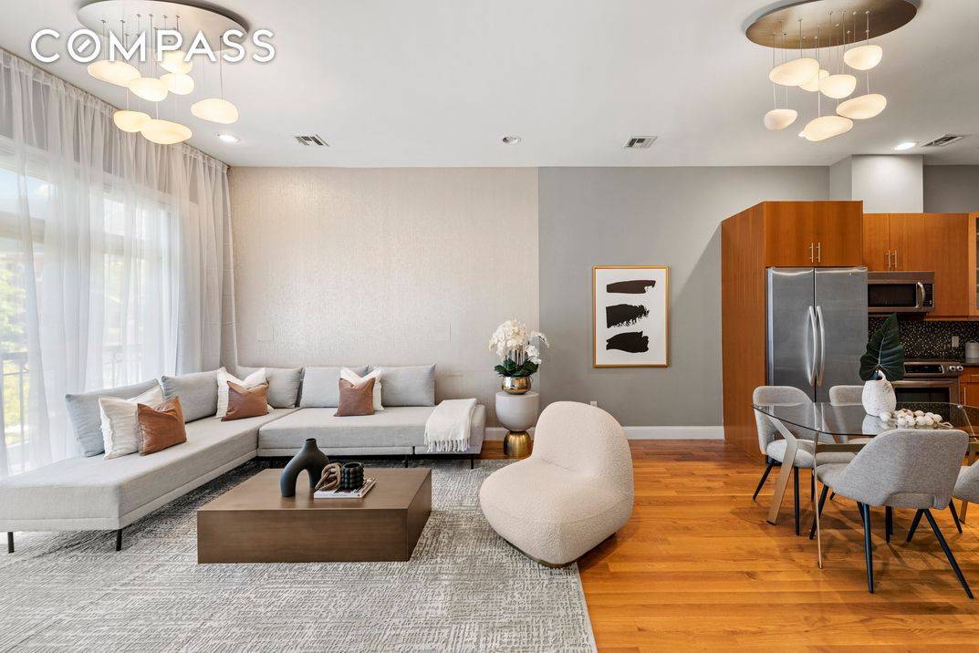 Breathtaking designer style awaits in this sun splashed two bedroom, two bathroom condominium featuring expansive interiors and a wonderful location in a contemporary Columbia Waterfront District condominium.