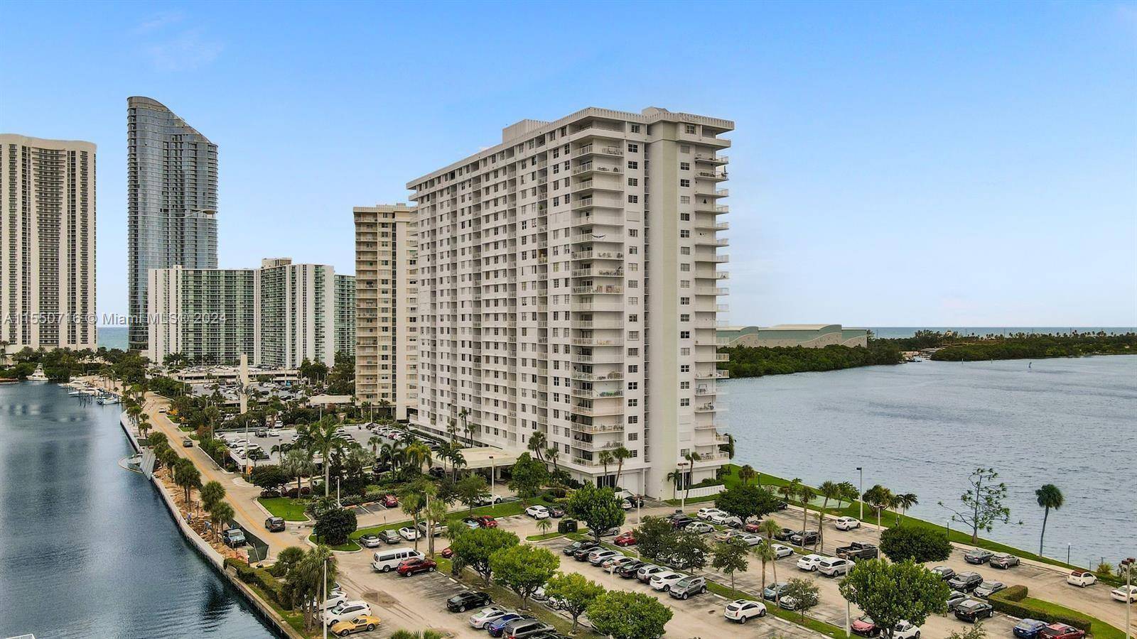 Experience the allure of this newly restored apartment boasting expansive spaces, a balcony with captivating intercoastal views for yacht watching, sunrises, and sunsets.