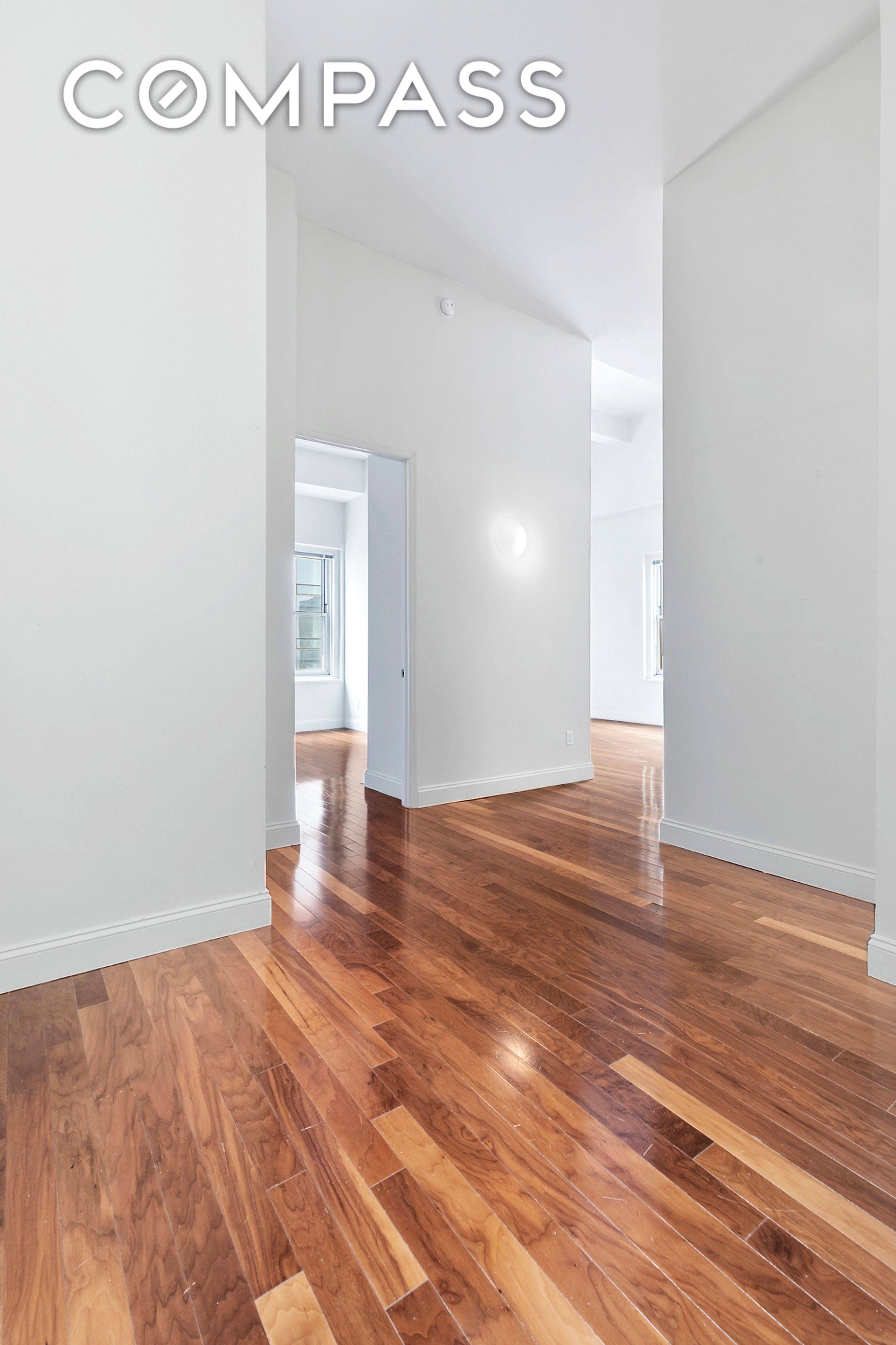 This corner one bedroom apartment with 16 ceilings throughout offers spectacular views of downtown New York and water views from oversized windows.