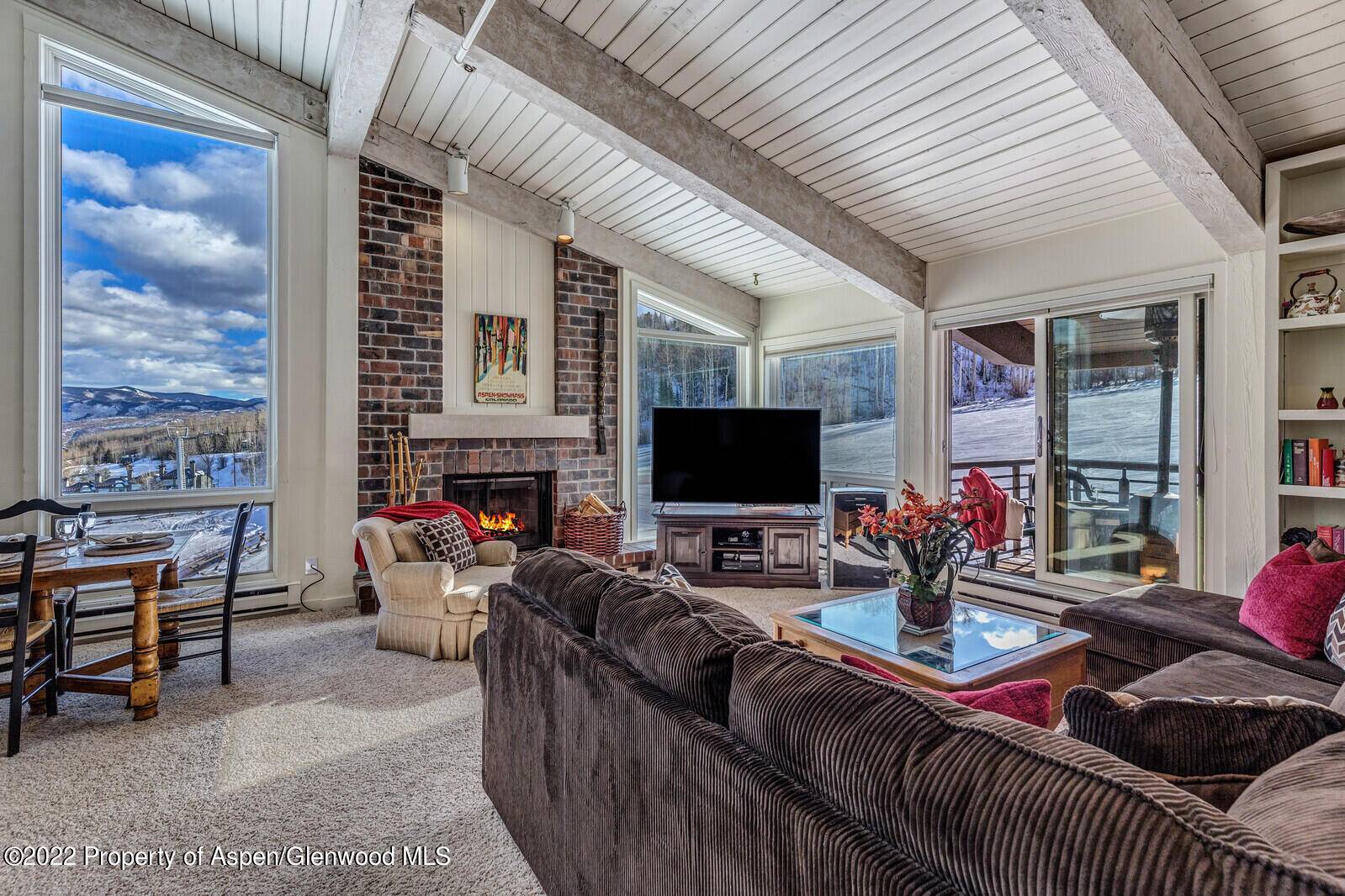 Enjoy fantastic views of the slopes from this highly desirable top floor four bedroom slopeside ski in ski out condo.