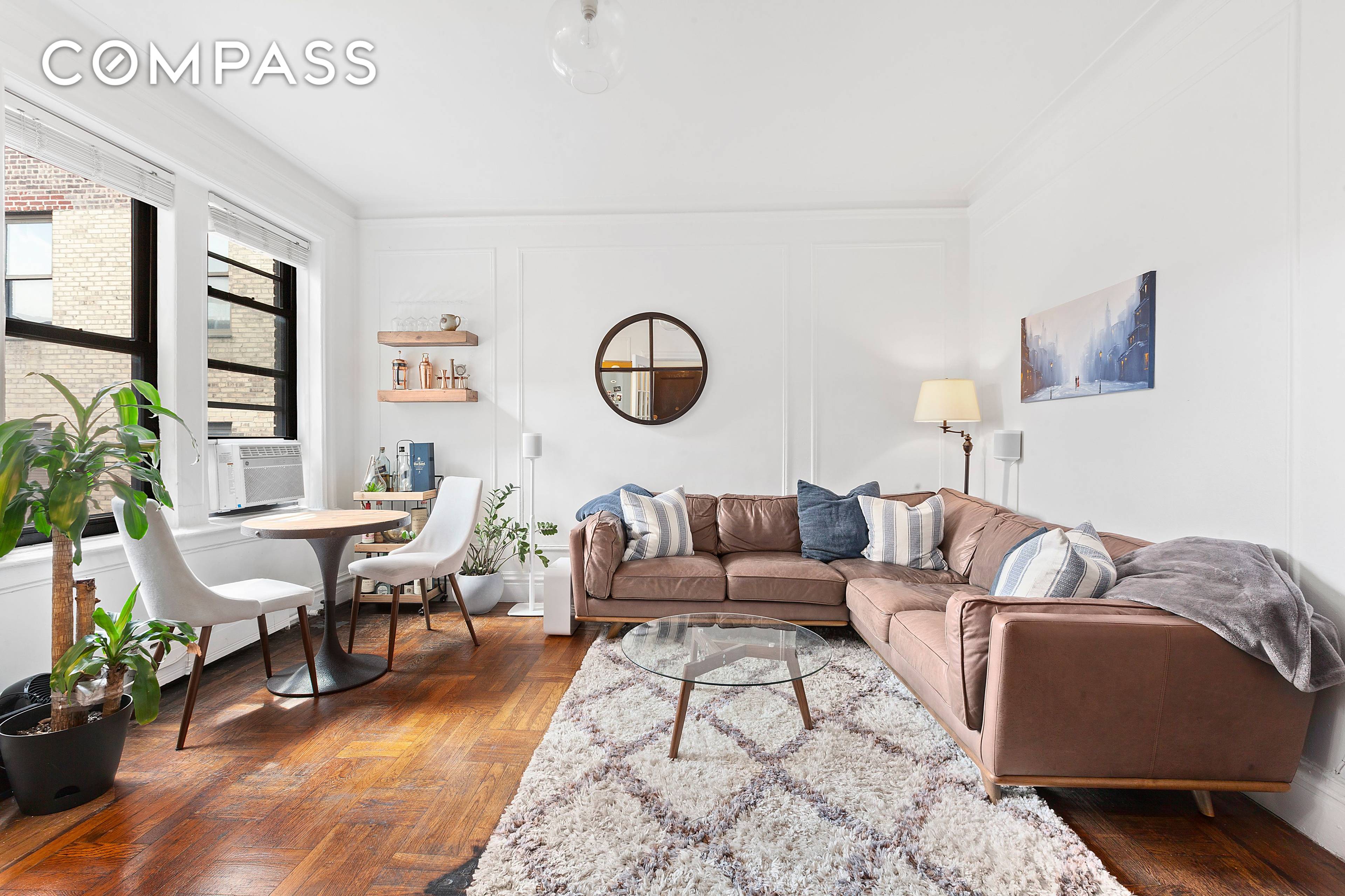 Welcome to sunny 205 East 10th Street, Apartment 6E, a stunning, pre war building in the heart of the East Village with an elegant, wrought iron building entrance and tastefully ...