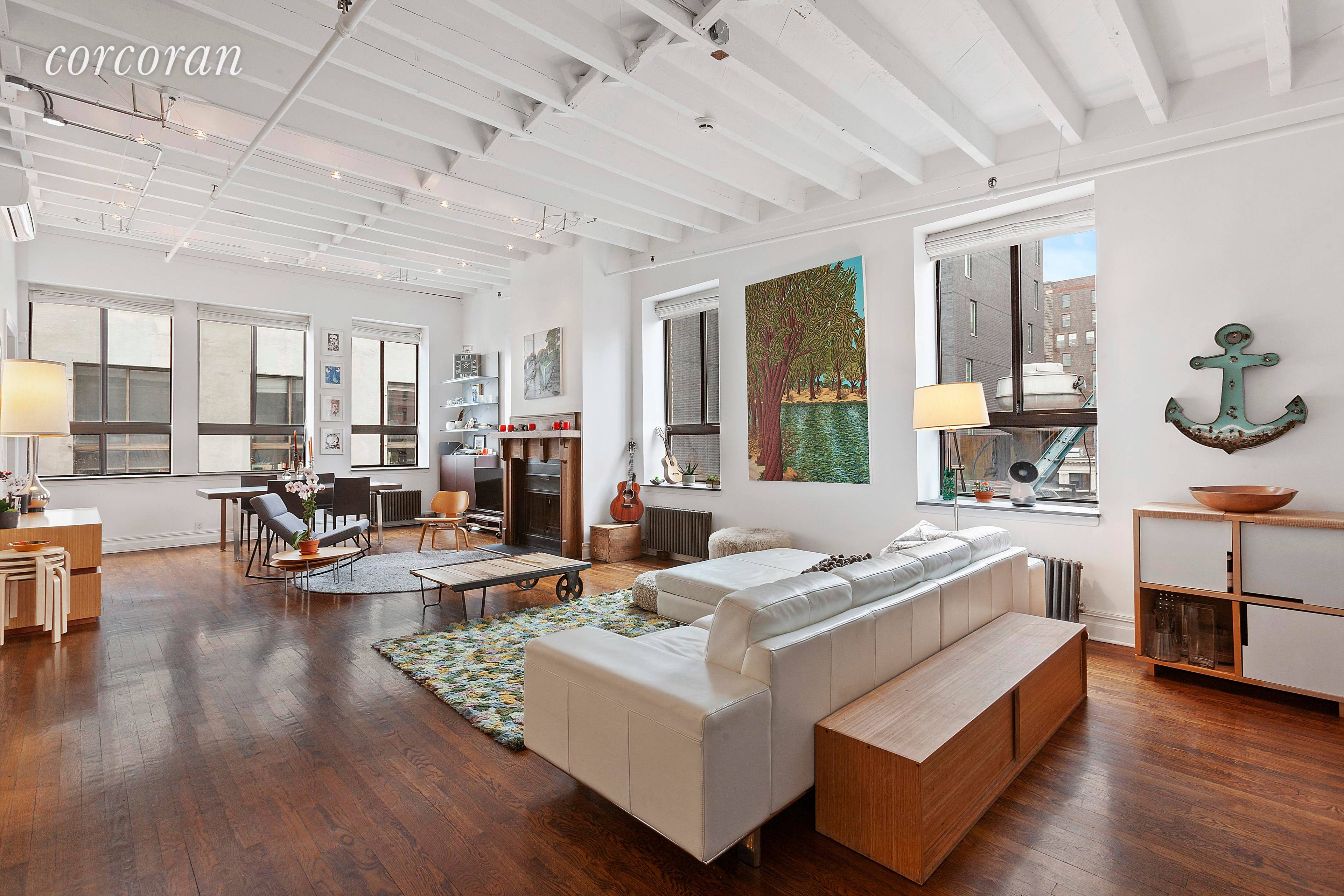 Sprawling Chelsea Penthouse Loft with sprawling roof deck.