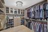 Custom built in walk in closet w/ tons of drawers - great storage