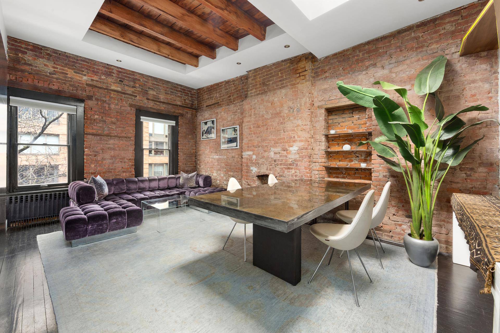 Located on a quiet tree lined block at the crossroads of Chelsea and the West Village, this tranquil top floor loft like one bedroom one bathroom townhouse home offers sun ...