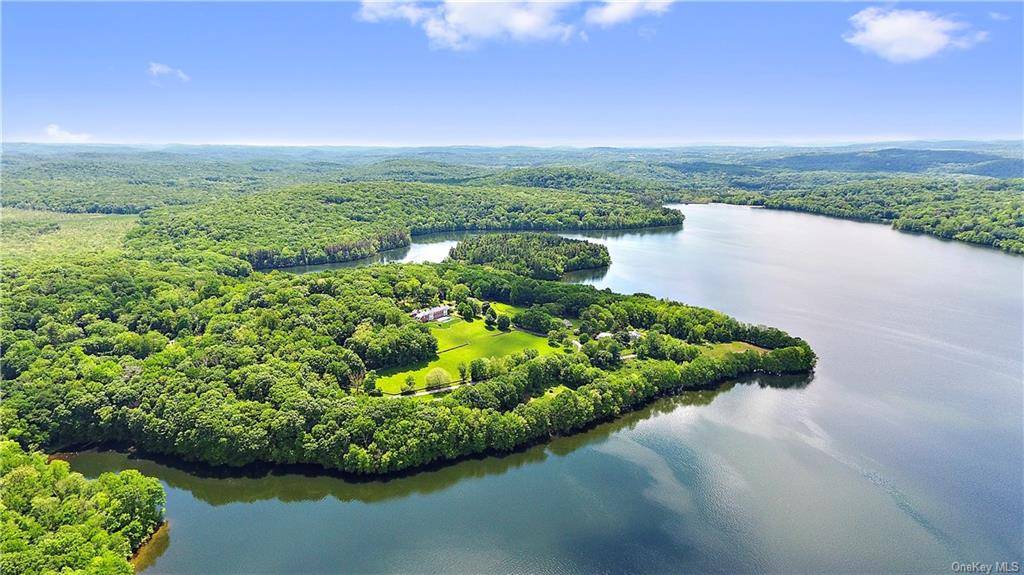 Beautiful summer rental offers privacy and luxury with spectacular 180 degree views of the Titicus Reservoir.
