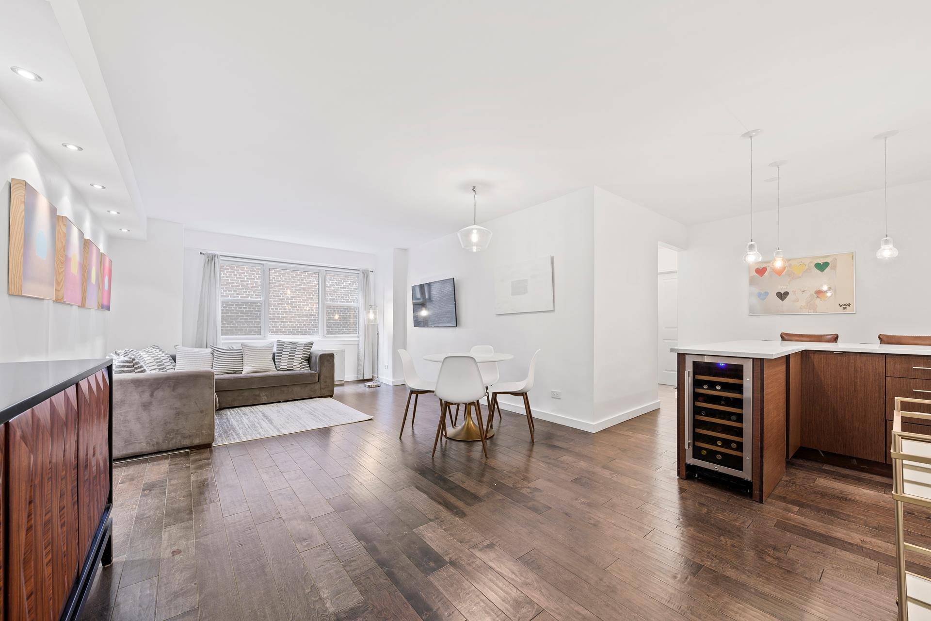 Enjoy living in this spacious, gorgeously renovated true 2 bedroom 2 full bathroom apartment located in the John Adams, the West Village's premier full service co op.