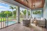 Covered Balcony with pool views