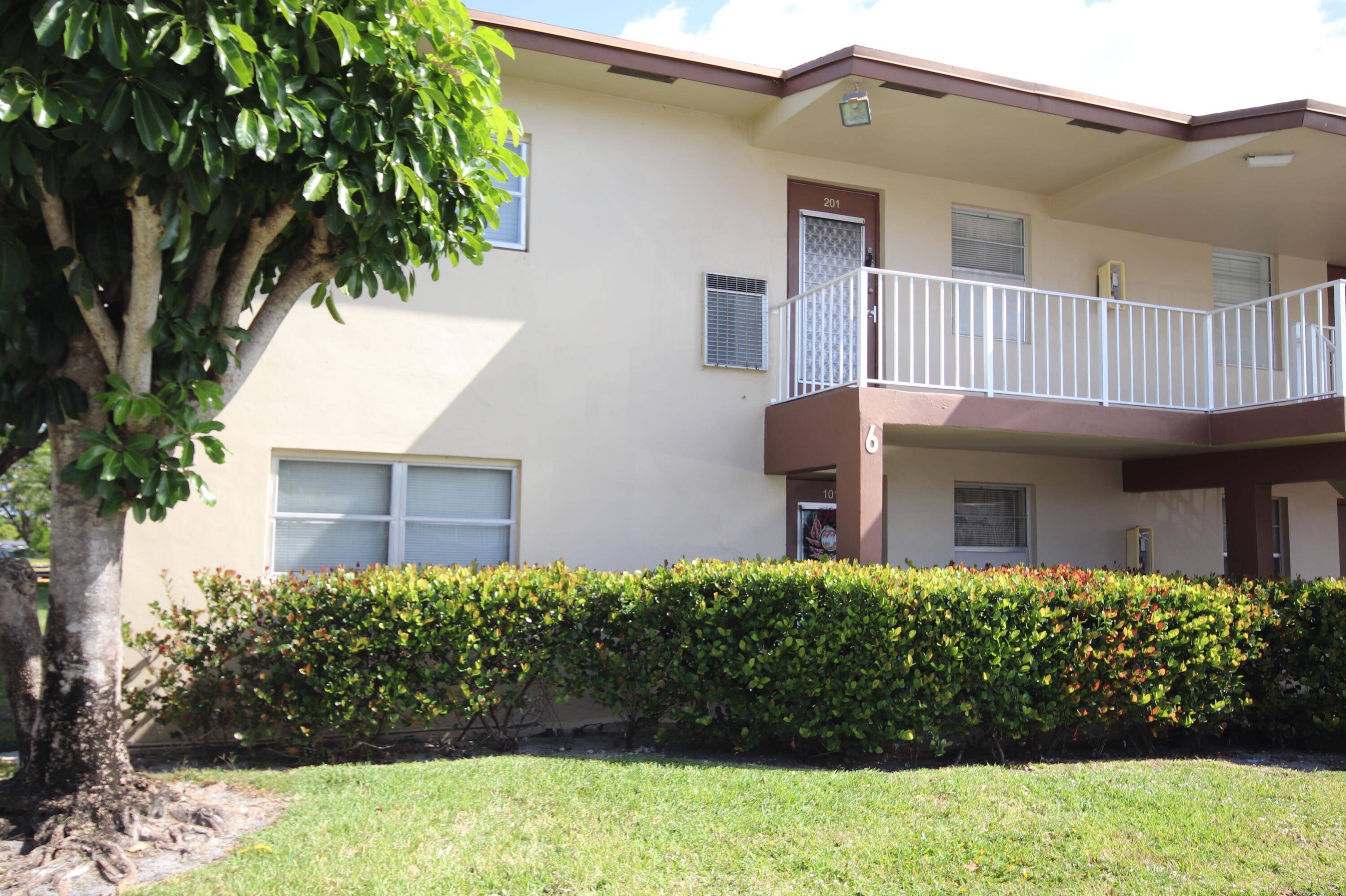 Fully Furnished move in ready 2 bedroom, 2 bath corner unit condo in well maintained Oriole Gardens featuring windows in all rooms for a bright and airy living, tiled throughout, ...