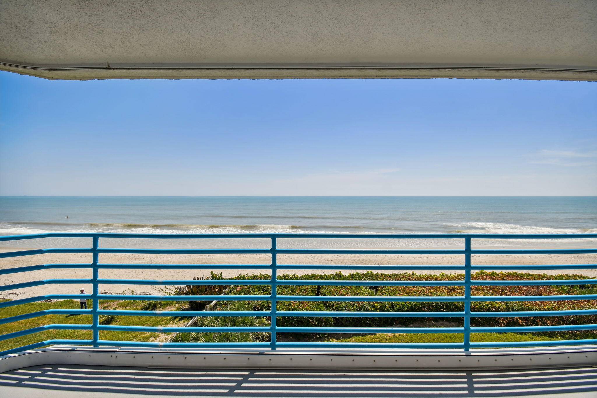 ONT CONDO, ON THE SAND, WALL TO WALL SLIDERS IN THE LIVING ROOM AND PRIMARY BEDROOM, VIEW THE ROCKET LAUNCHES FROM YOUR PRIVATE OVERSIZED BALCONY, 3 BEDROOMS SPLIT PLAN AND ...