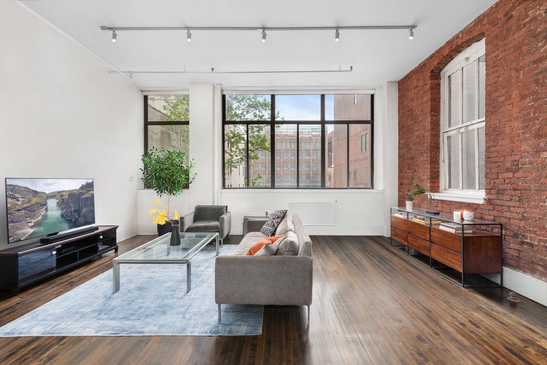 Move in ready downtown loft with soaring ceilings and plenty of prewar details.
