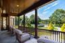 Deck featuring view of scattered trees