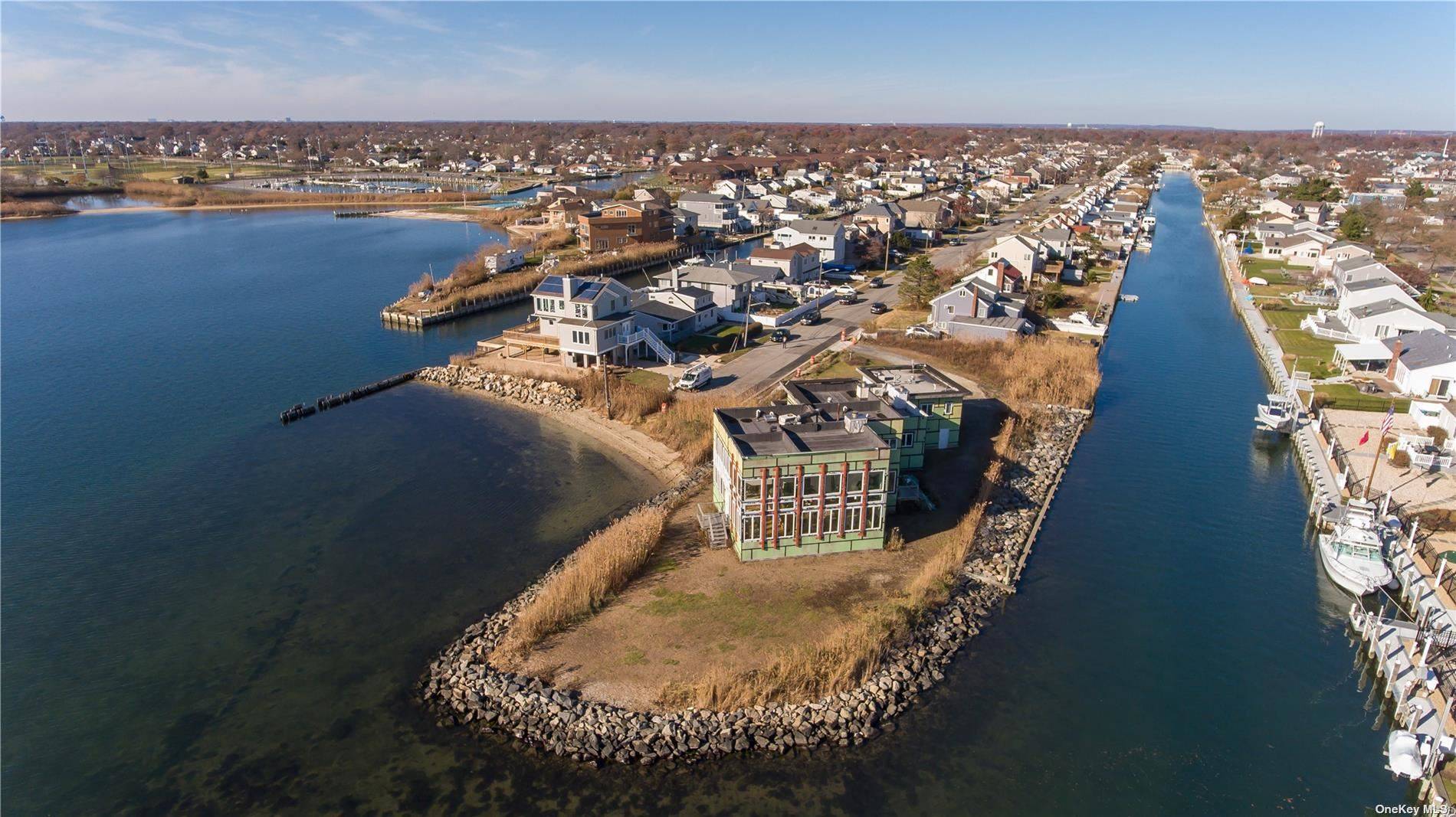 Unique Hampton's Style Bay Front Opportunity Built on Approximately 85 Piles.