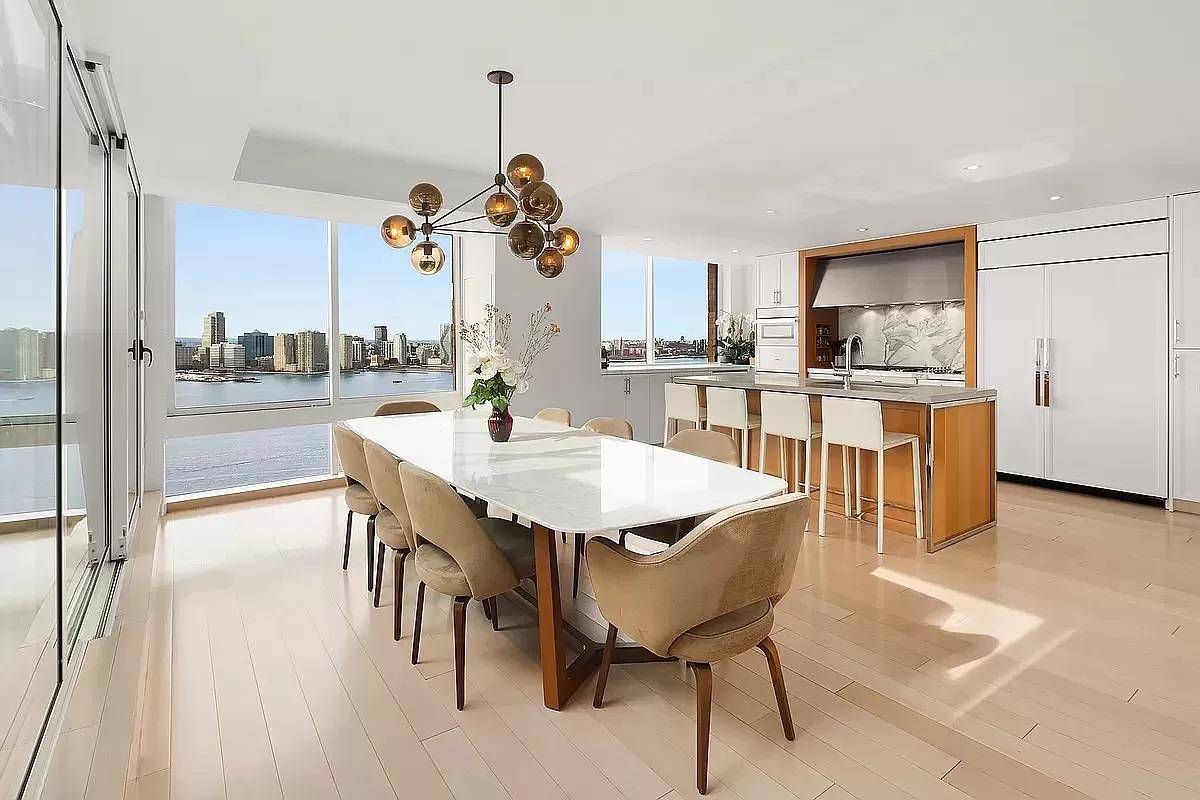 Luxurious Penthouse Living with Breathtaking ViewsStep into an unparalleled realm of luxury with this magnificent 4, 386 square foot penthouse residence at River amp ; Warren.