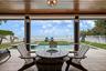Covered ground level patio with direct access to the beach!