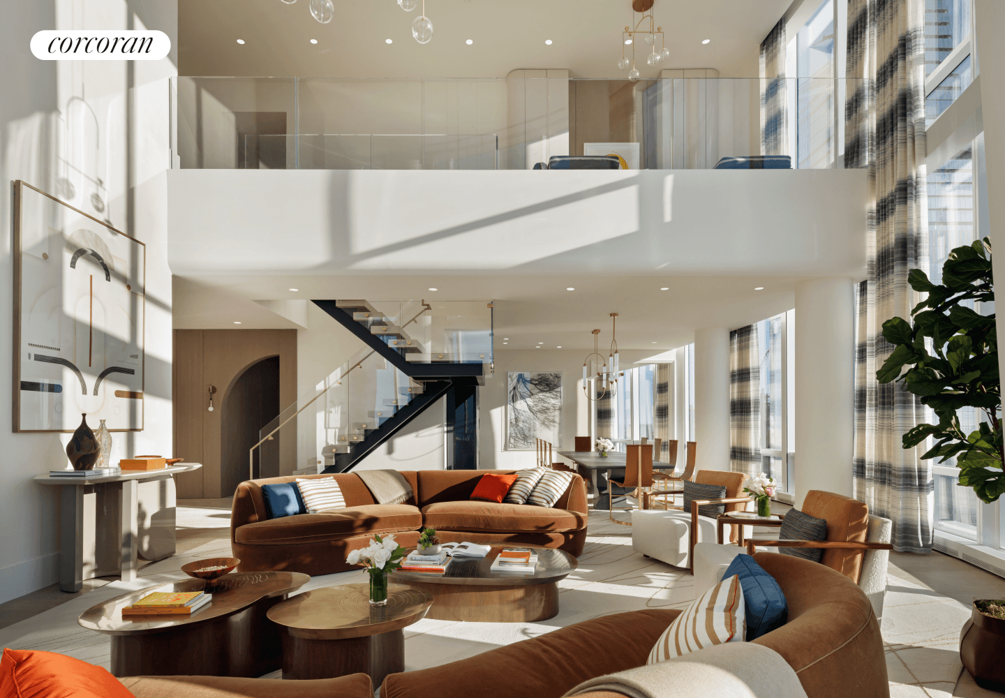 DOUBLE HEIGHT DRAMA WITH SWEEPING VIEWS OF THE NEW YORK CITY SKYLINE FROM EVERY ROOM.