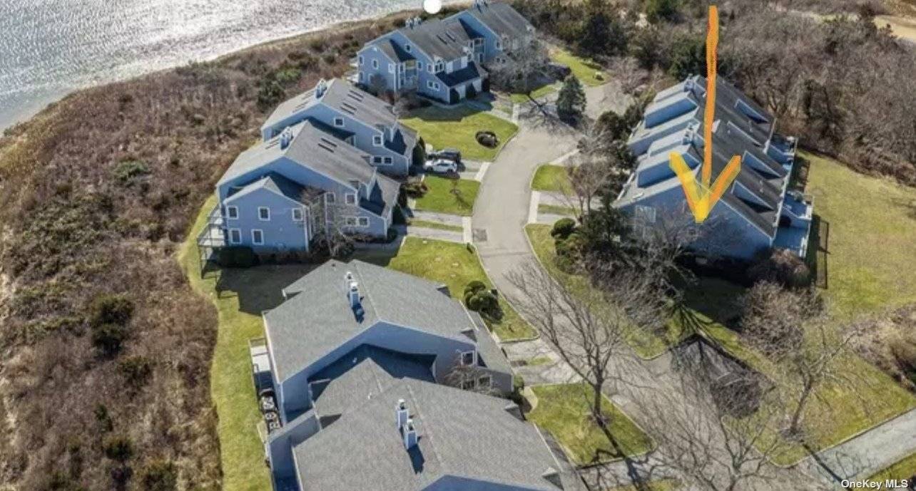 The heart of Southold now offers this luxury light filled end unit in The Cove community with direct water access so convenient for paddle boarding and kayaking.