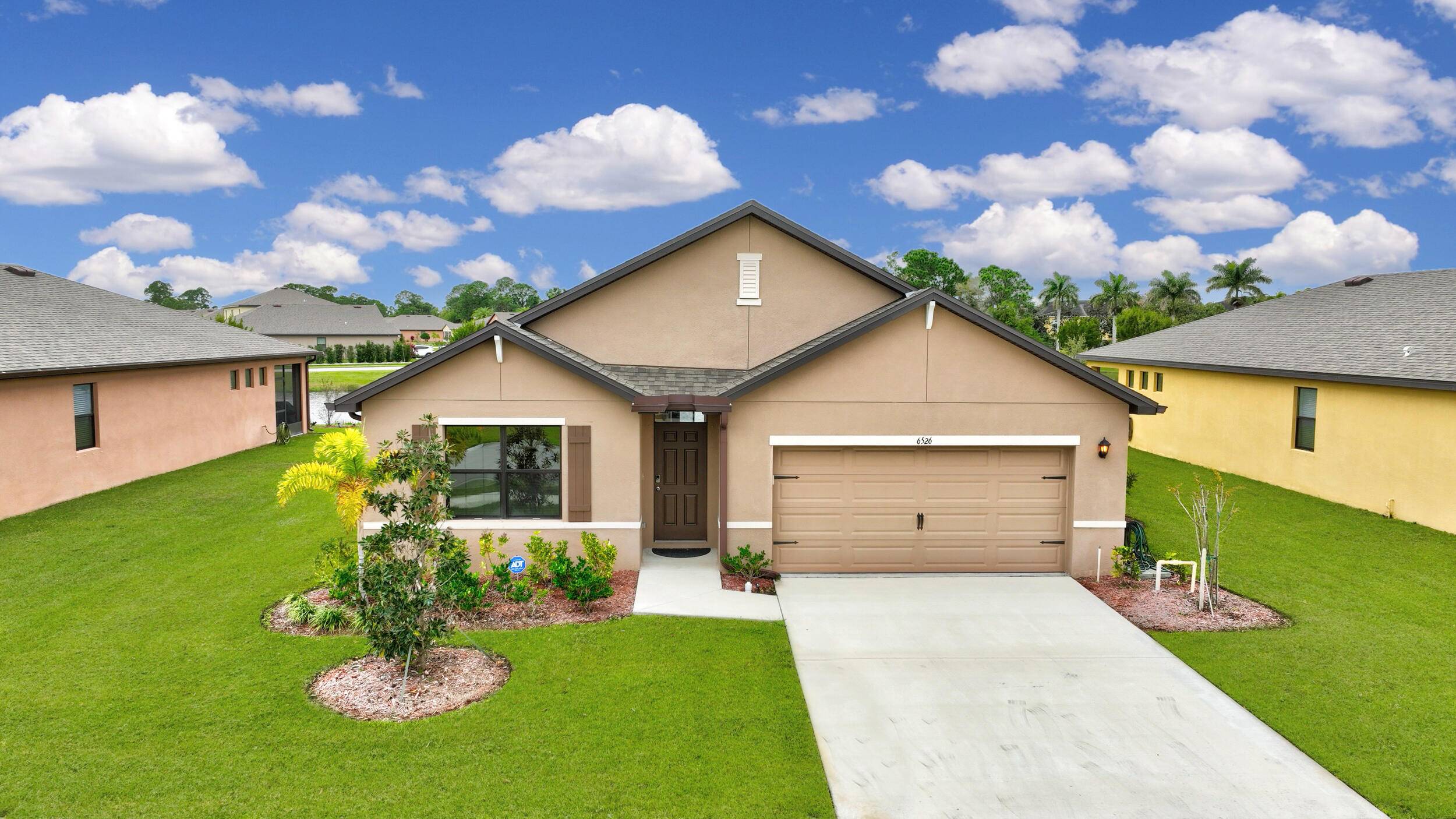 Stunning and well designed ranch layout featuring an expansive family room seamlessly connecting to a relaxed dining space and an open kitchen with a central island.