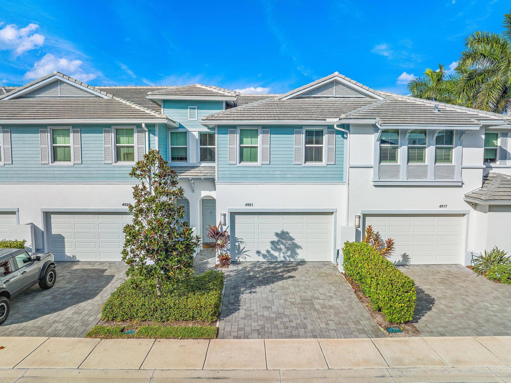 Welcome to your dream home in the heart of Midtown Palm Beach Gardens !