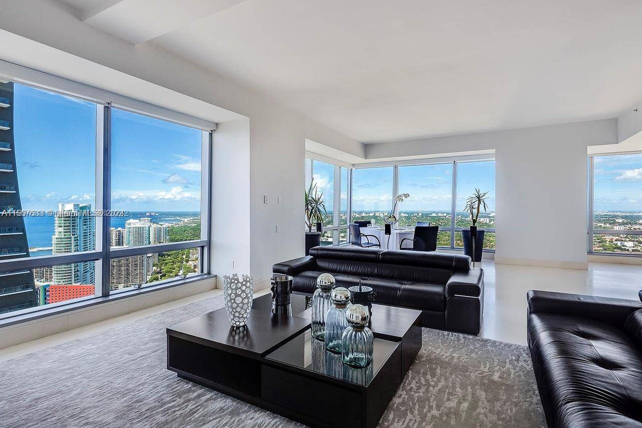 Rising 49 floors high, enjoy spectacular Biscayne Bay and Brickell skyline views from this stunning 2 bed 2.