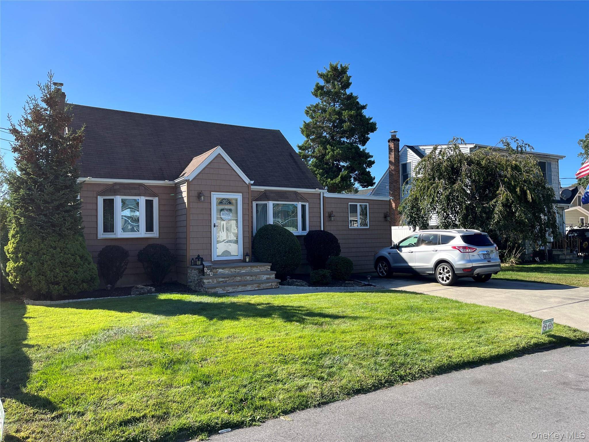 Charming Cape with Great Curb Appeal !