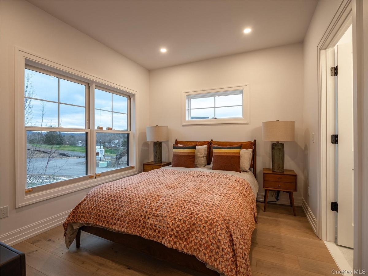 Bedroom featuring wood-type flooring and recessed lighting