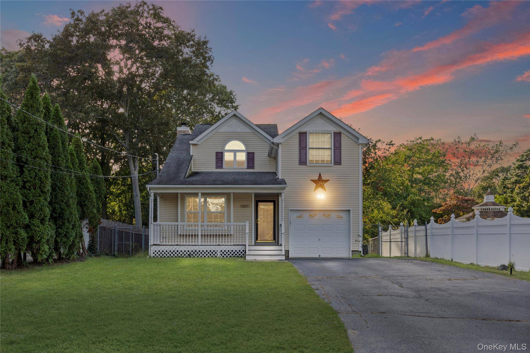Welcome to this beautiful Colonial home, set back an impressive 90 feet from the street, offering both privacy and charm.