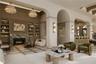 Owner's Lounge featuring an elegant gathering space centered around a statement fireplace.