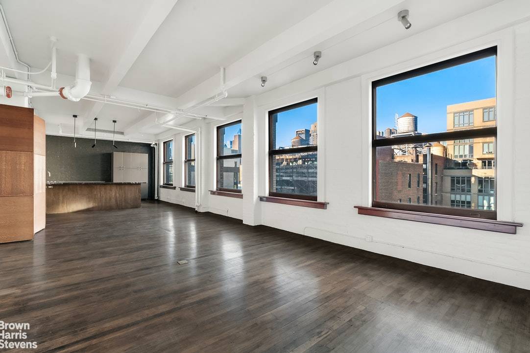 Loft style at its best ! Remarkable 50ft parade of enormous North facing windows, with a view of the of the Empire State Building, and an East window with a ...
