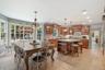 Dining area with recessed lighting and light tile patterned flooring