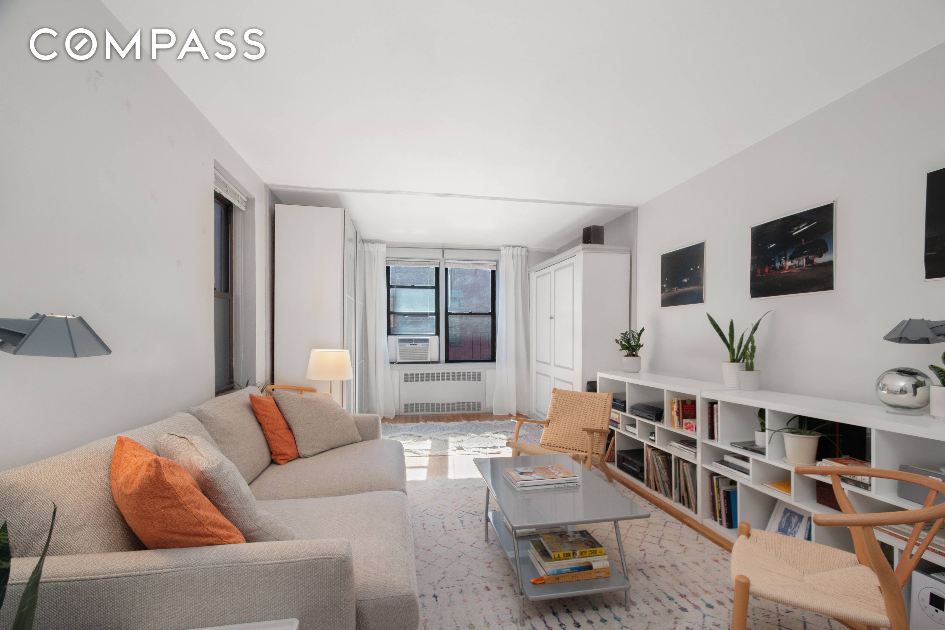 Sunfilled and quiet South facing oversized studio home located at 50 54 East 8th Street, an immaculately kept elevator cooperative in the heart of Greenwich Village.