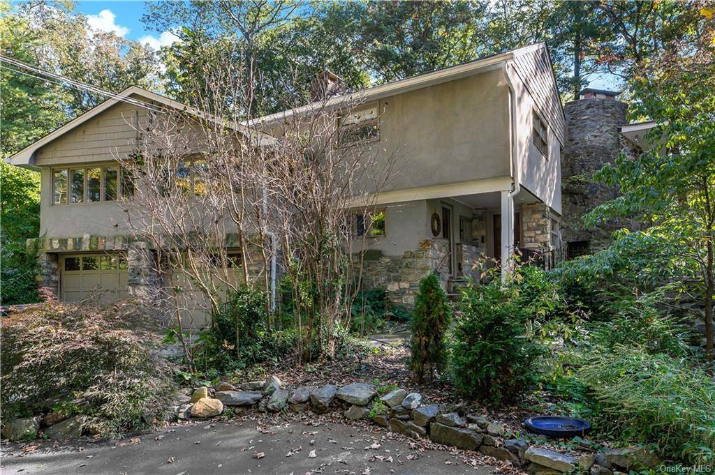 This is a short sale. Phenomenal stone home sitting on a gorgeous gorge.