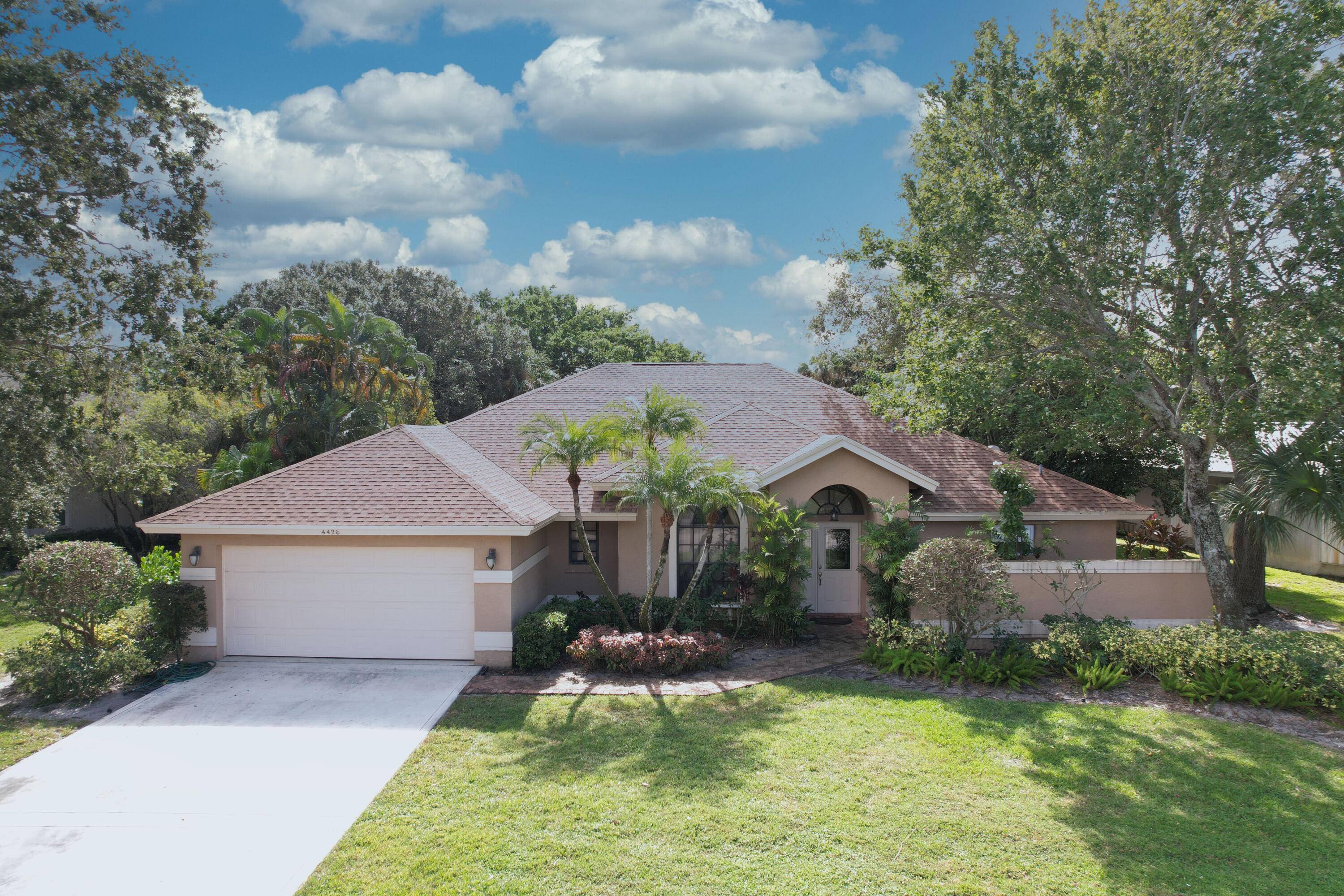 Wonderful home at a great price in very desirable Palm City gated community.
