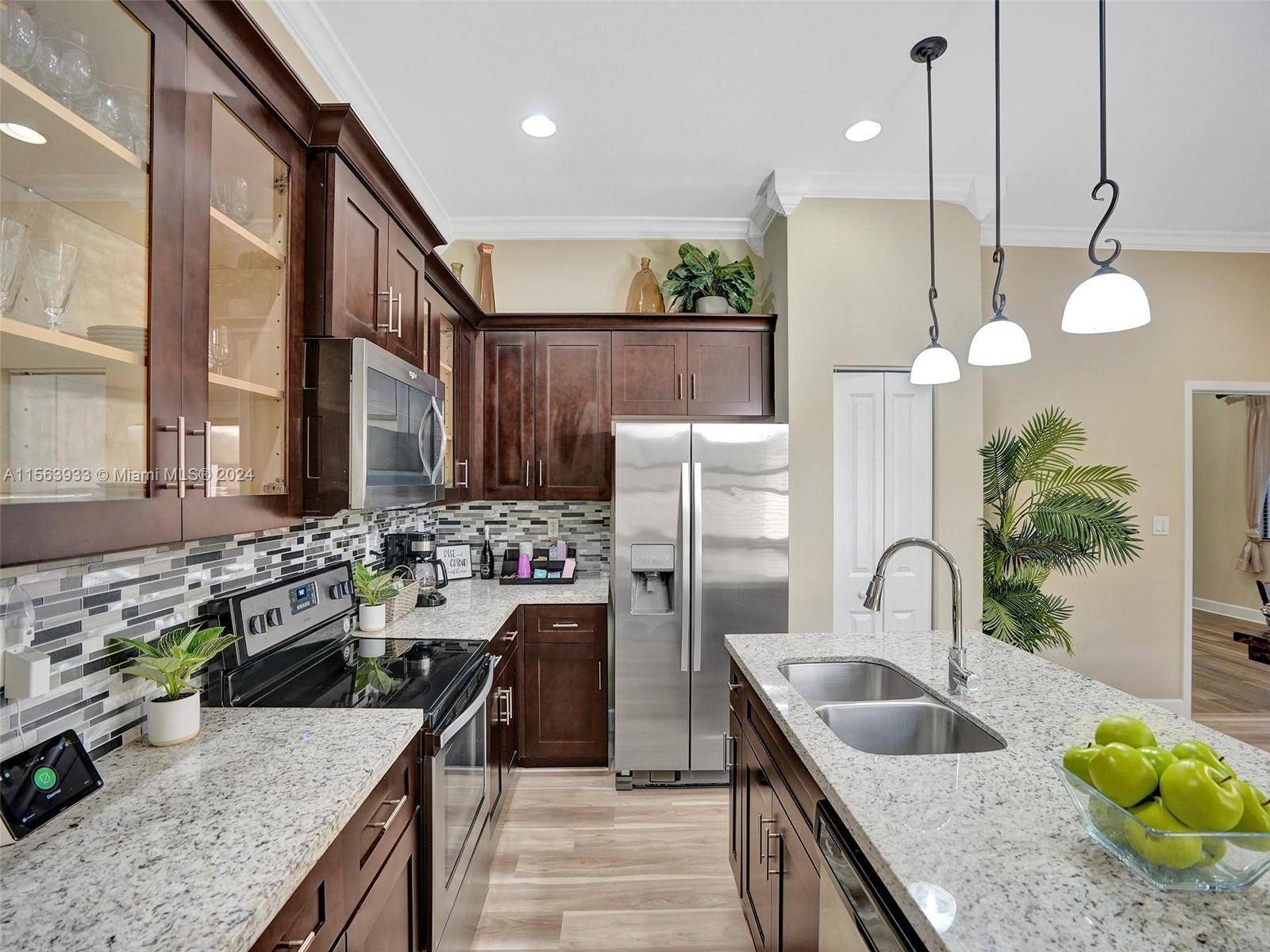 Discover this stunning 3BR 2BA gem in South Florida's coveted Manor Parc community !