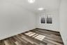 Spare room with wood finished floors