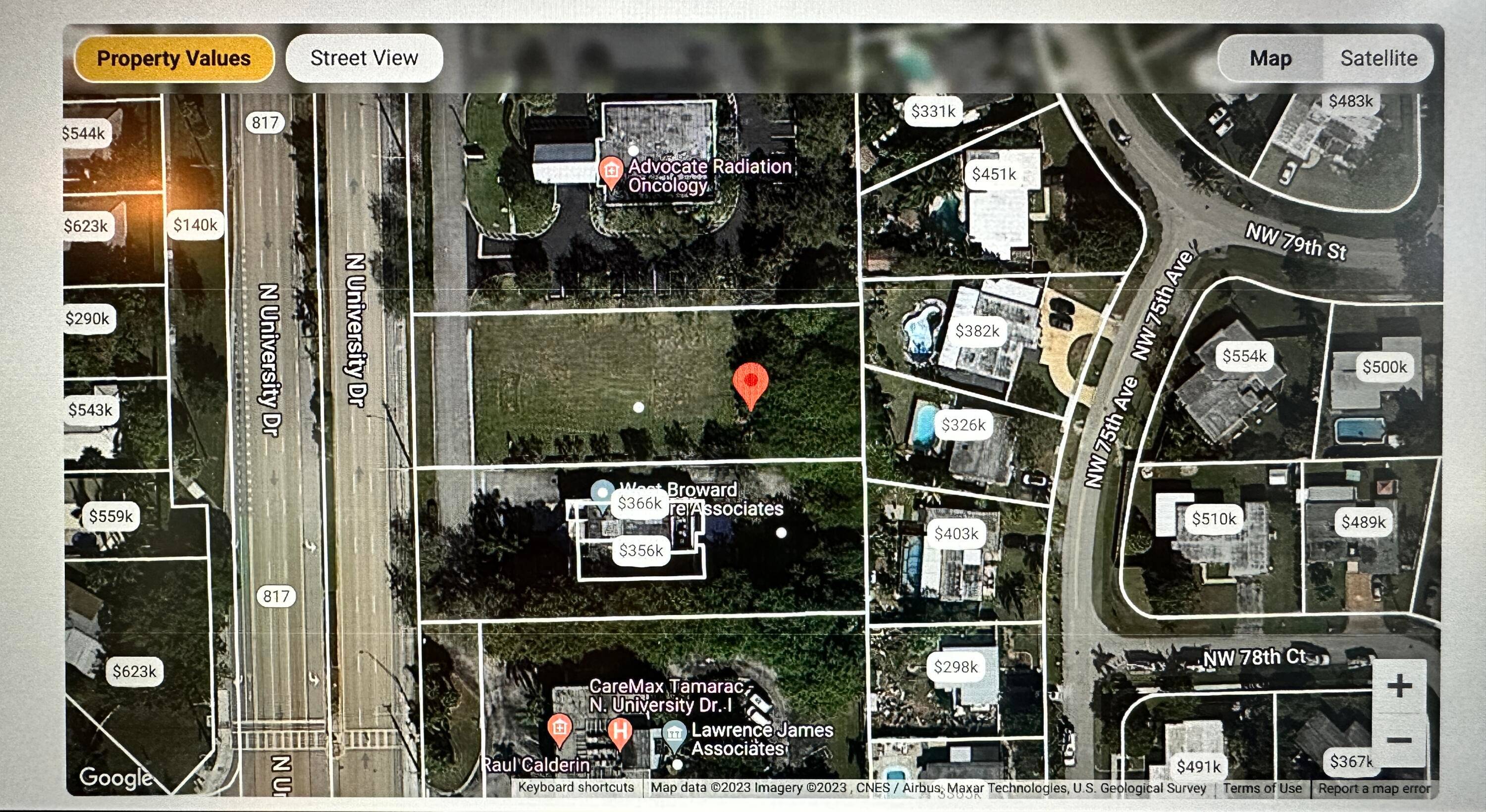 For sale or lease with option to purchase site plan approved commercial parcel on busy N.