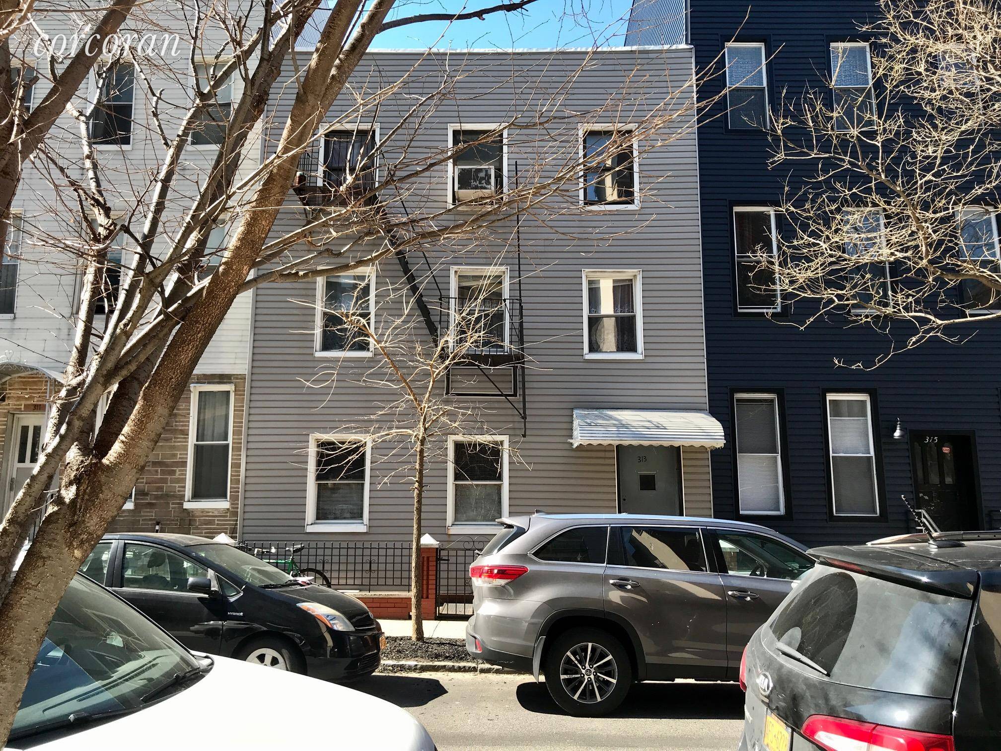 Six Unit Townhouse on a beautiful tree lined residential street in Prime Greenpoint Brooklyn.