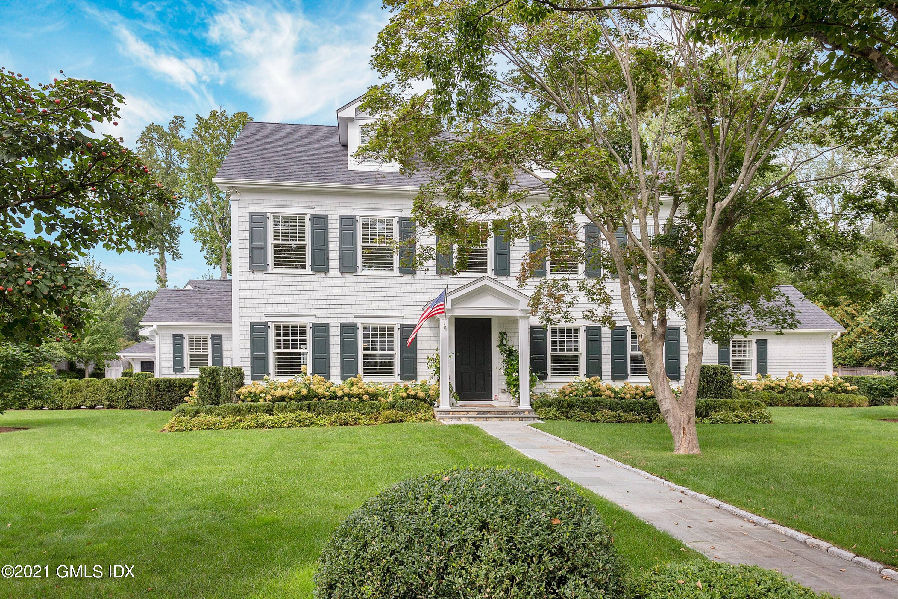 Incredible renovation of this recently built 6 bedroom Colonial located on a quiet street neighboring the Milbrook Club.