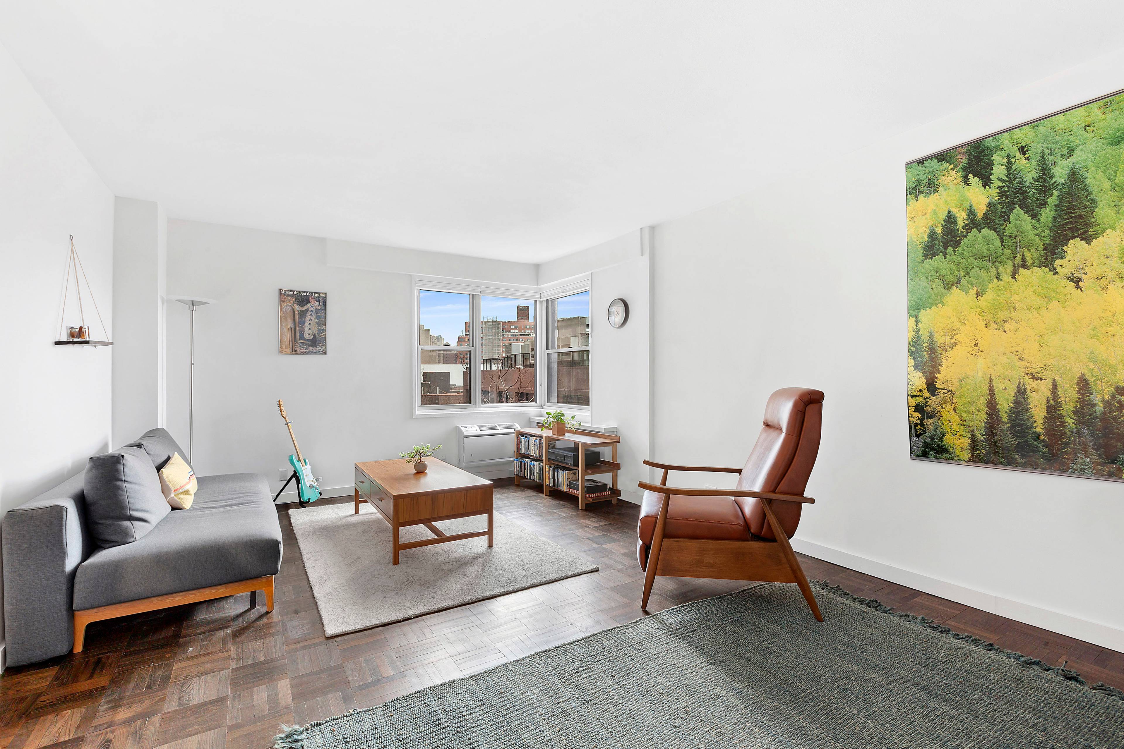 Enjoy beautiful tree top views overlooking historic Greenwich Village in this large studio that exudes comfort, calm, and style.