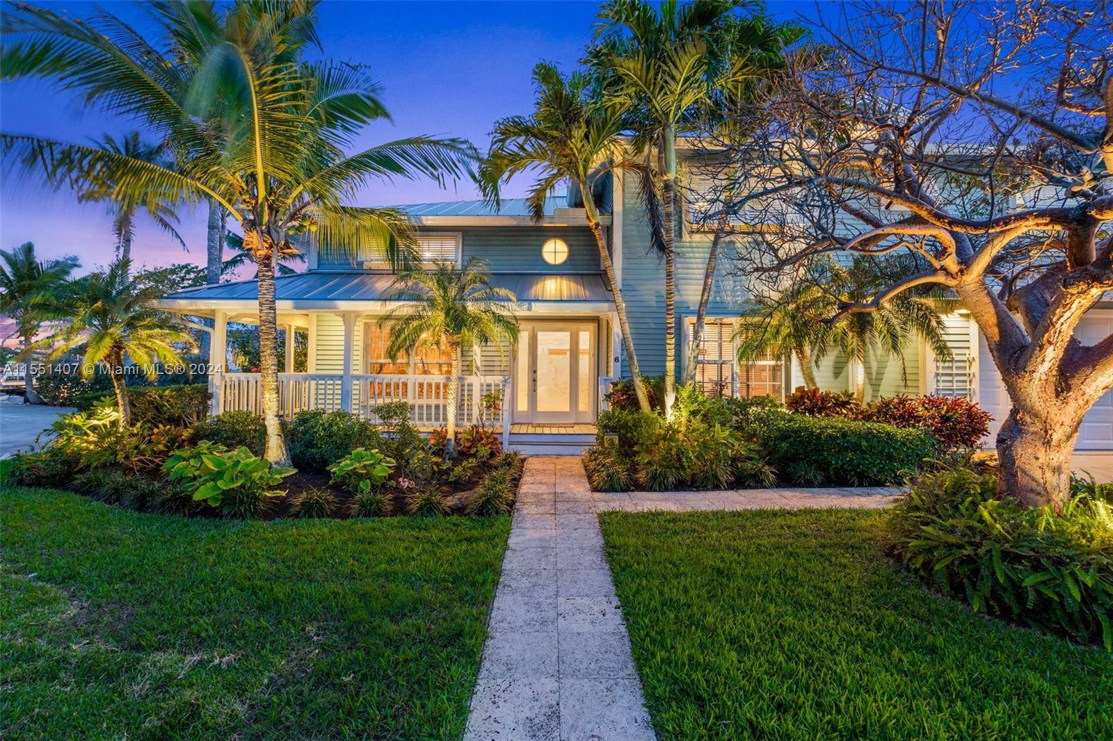 Stunning Key West style residence nestled along the tranquil waters of central Palm Beach County.
