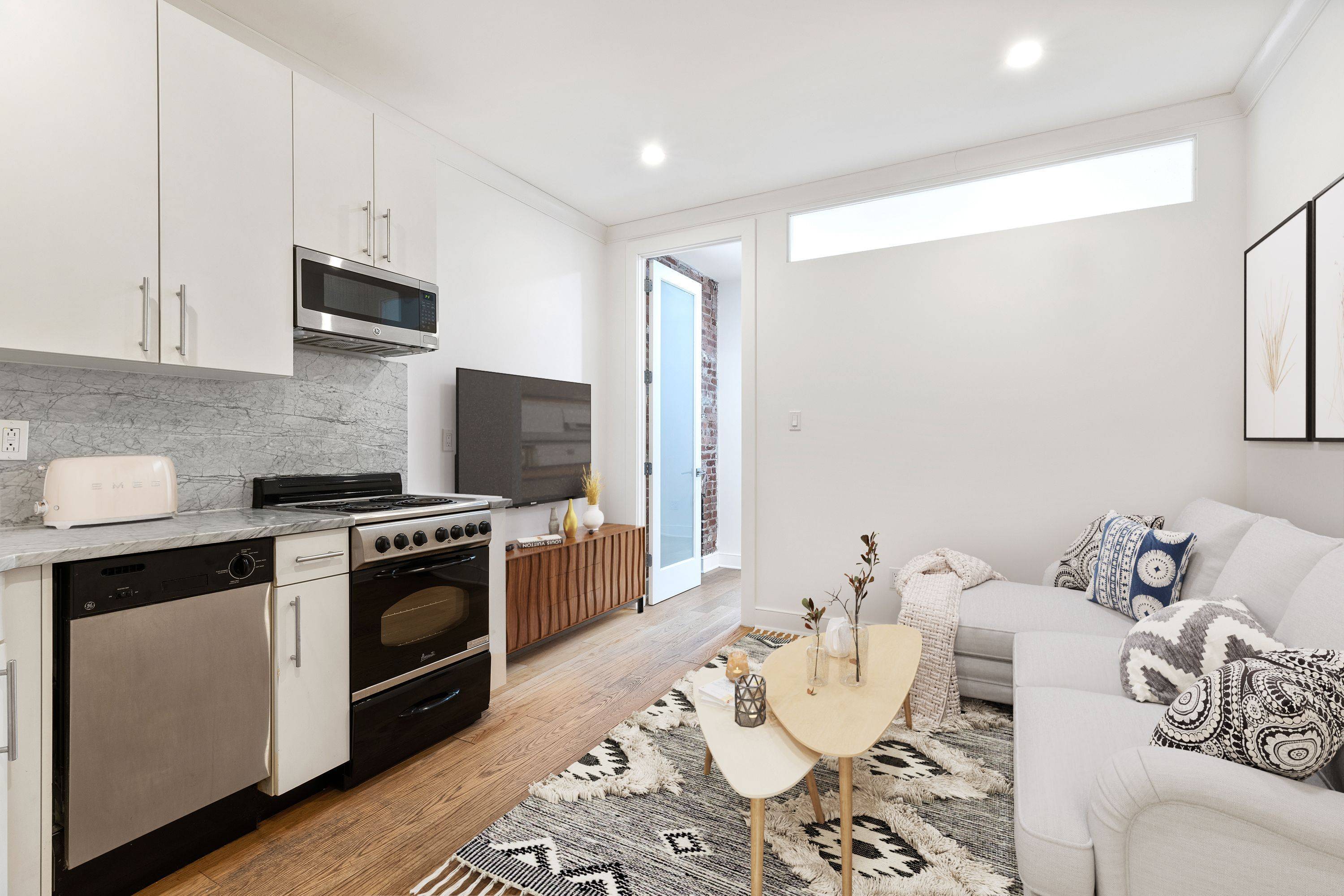 2 Queen sized bedrooms, 1 full bath residence featuring stainless steel appliances, granite countertops, designer details, renovated marble bathrooms with Kohler fixtures and a personal video intercom system.