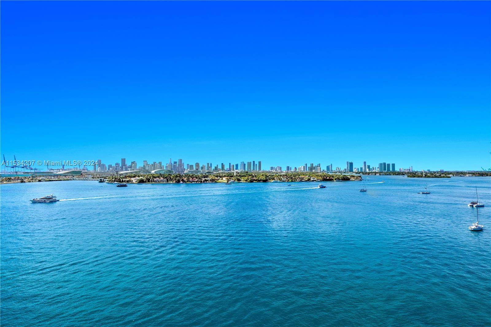 Fully remodeled southwest corner unit at the Floridian condominium boasting unobstructed vistas of both the bay downtown Miami from the wrap around balcony.