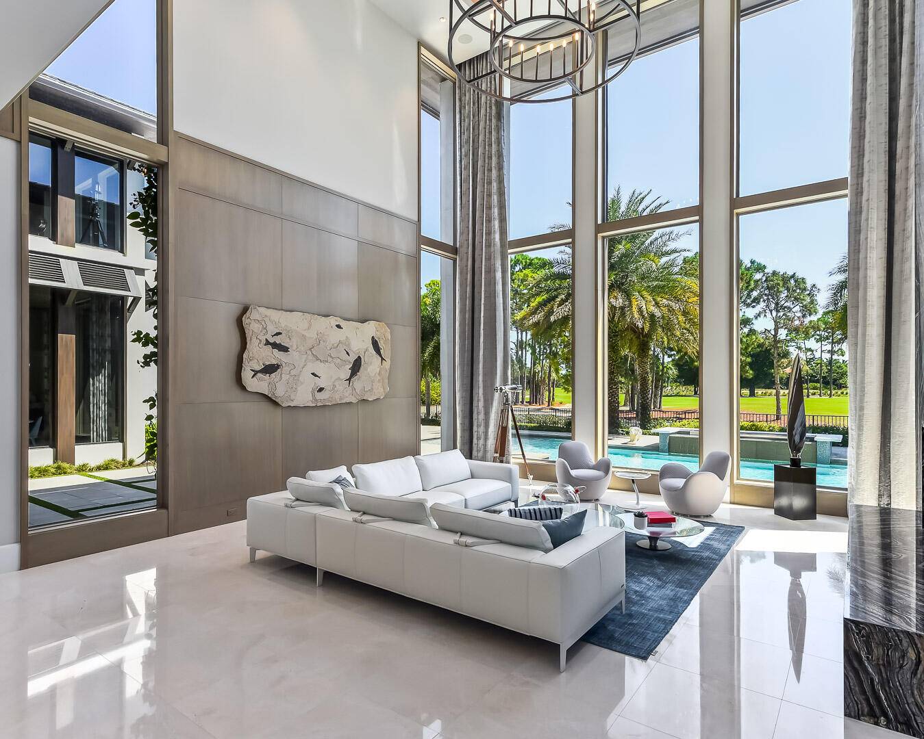 Exquisitely designed, this contemporary residence is the height of elegance and sophistication.