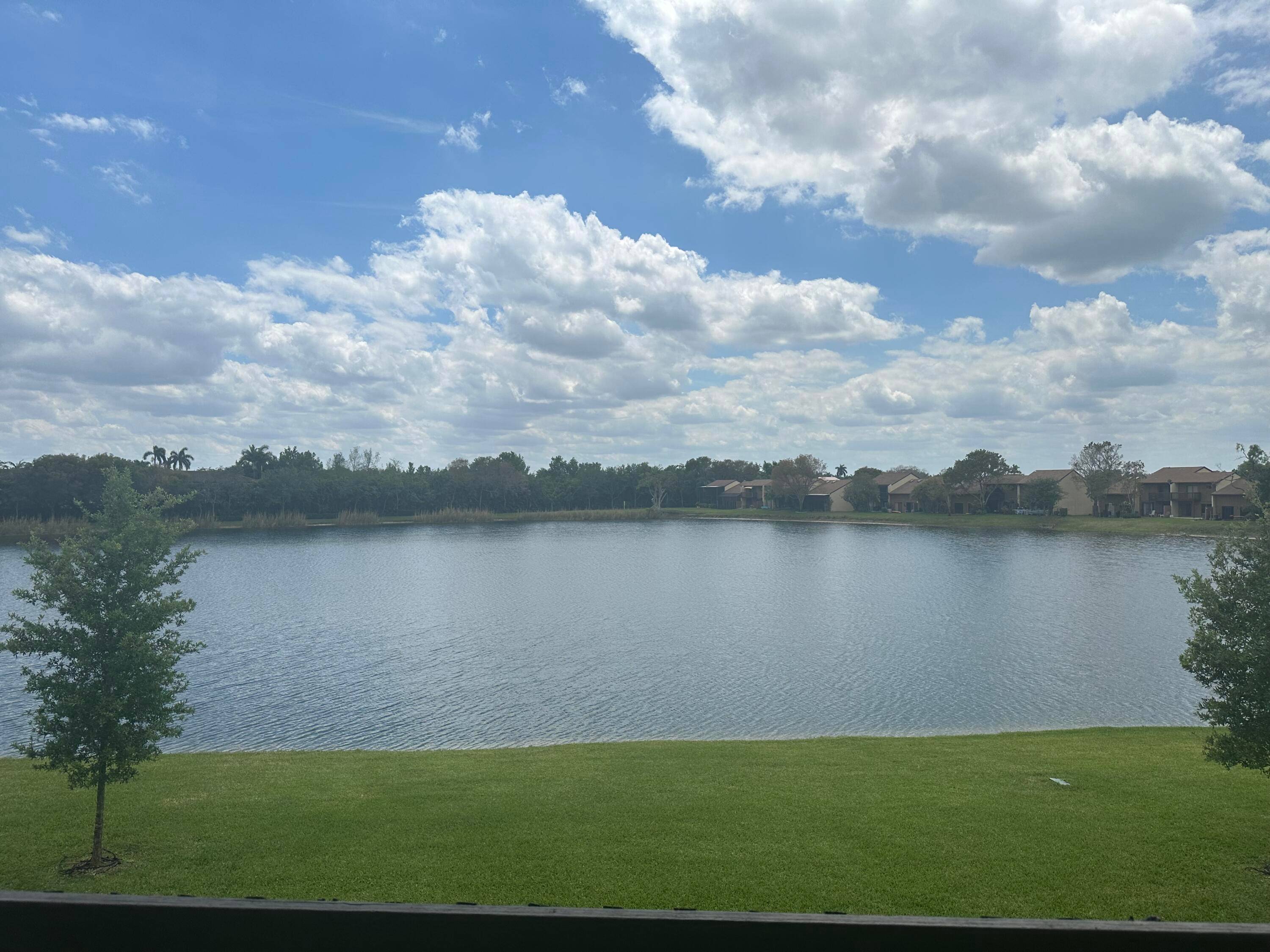 GREAT CORNER UNIT WITH FANTASTIC VIEWS OF LAKE FROM UPSTAIRS AND DOWNSTAIRS.