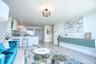 Living room with recessed lighting, light wood-style flooring, and baseboards