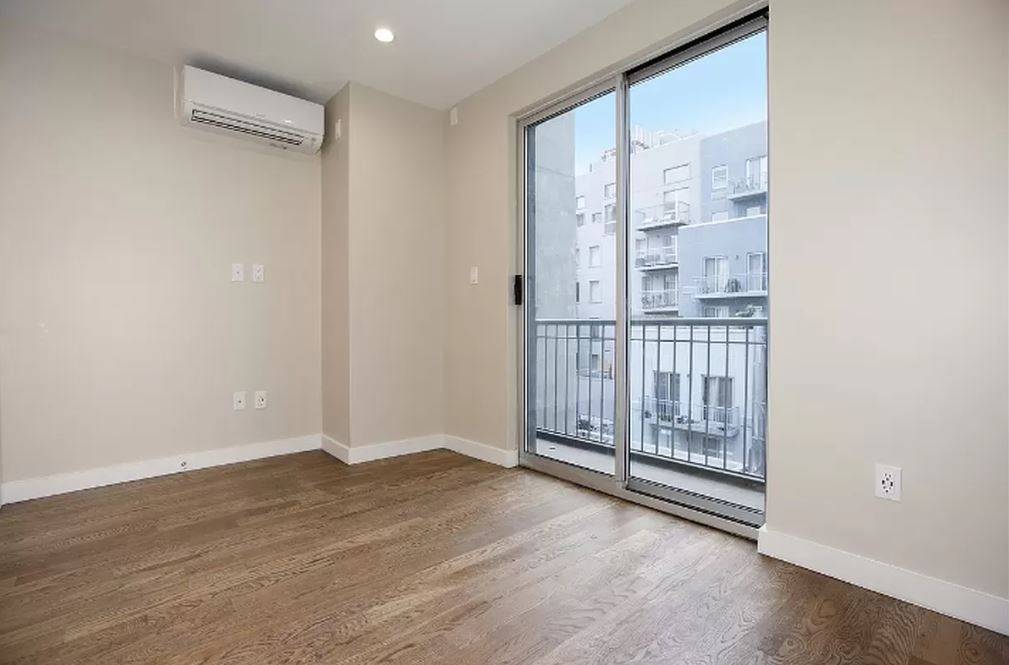 Live in this fully renovated floor through 3bedroom, 2 bathroom townhouse with balcony at 152 Ludlow Street !