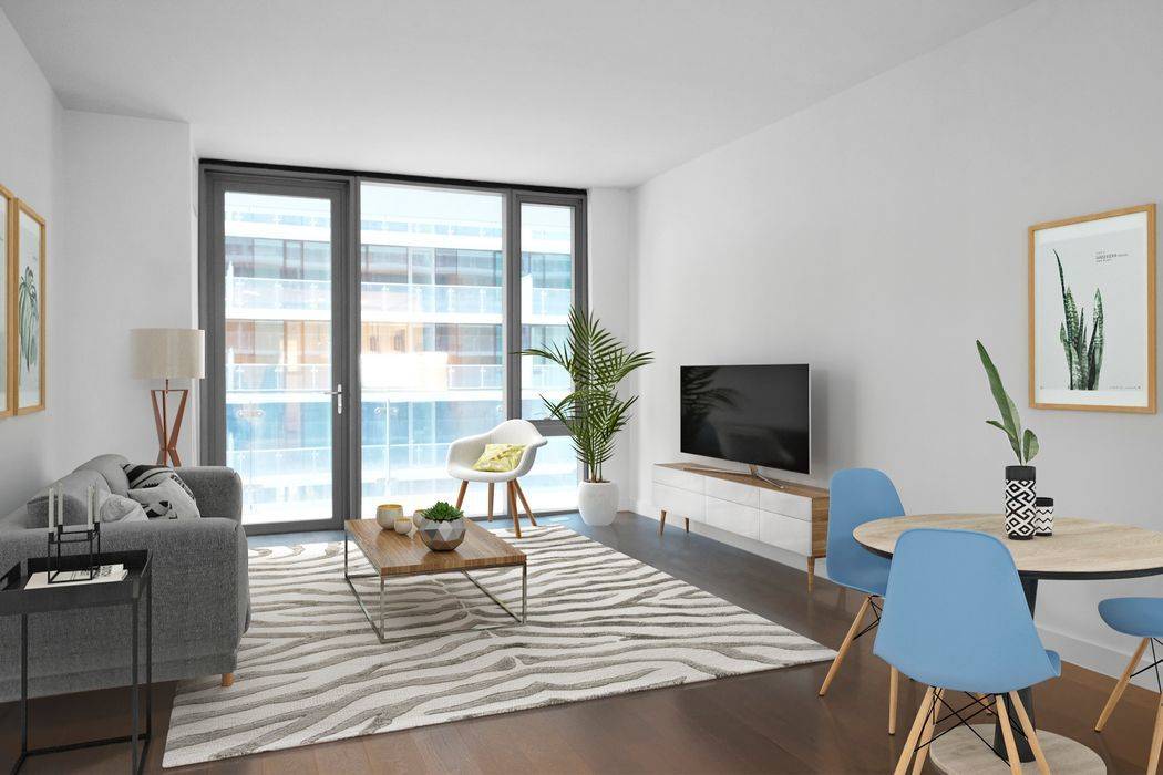 Experience luxurious living in the heart of Flushing at the highly desirable Grand Two of the Skyview Parc complex.